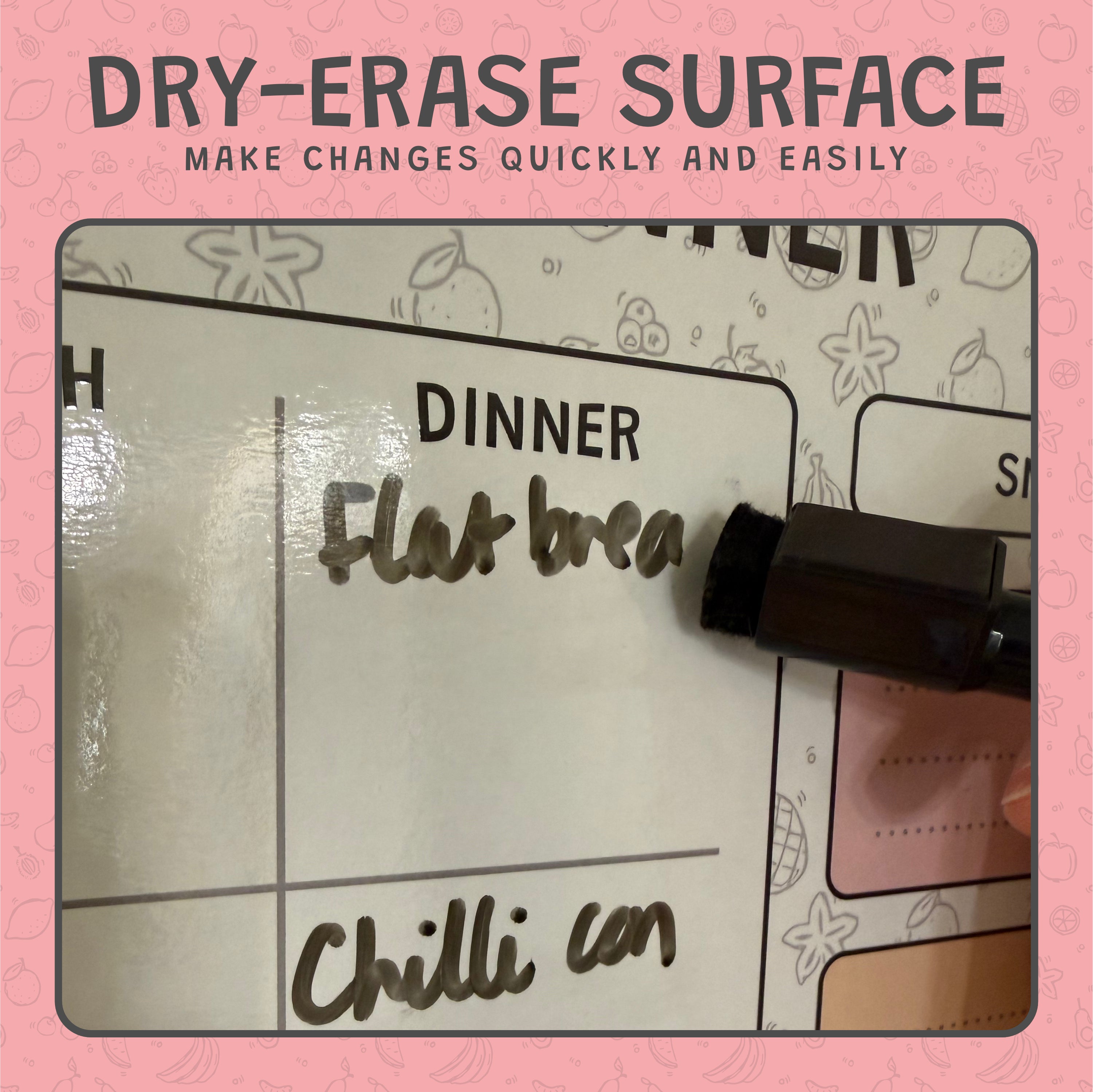 Dry-erase surface with writing and a marker on a pink background