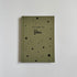 Green notebook with &