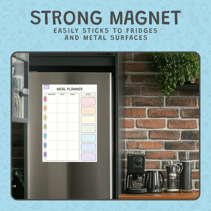 Fridge with a meal planner magnet on a brick wall background